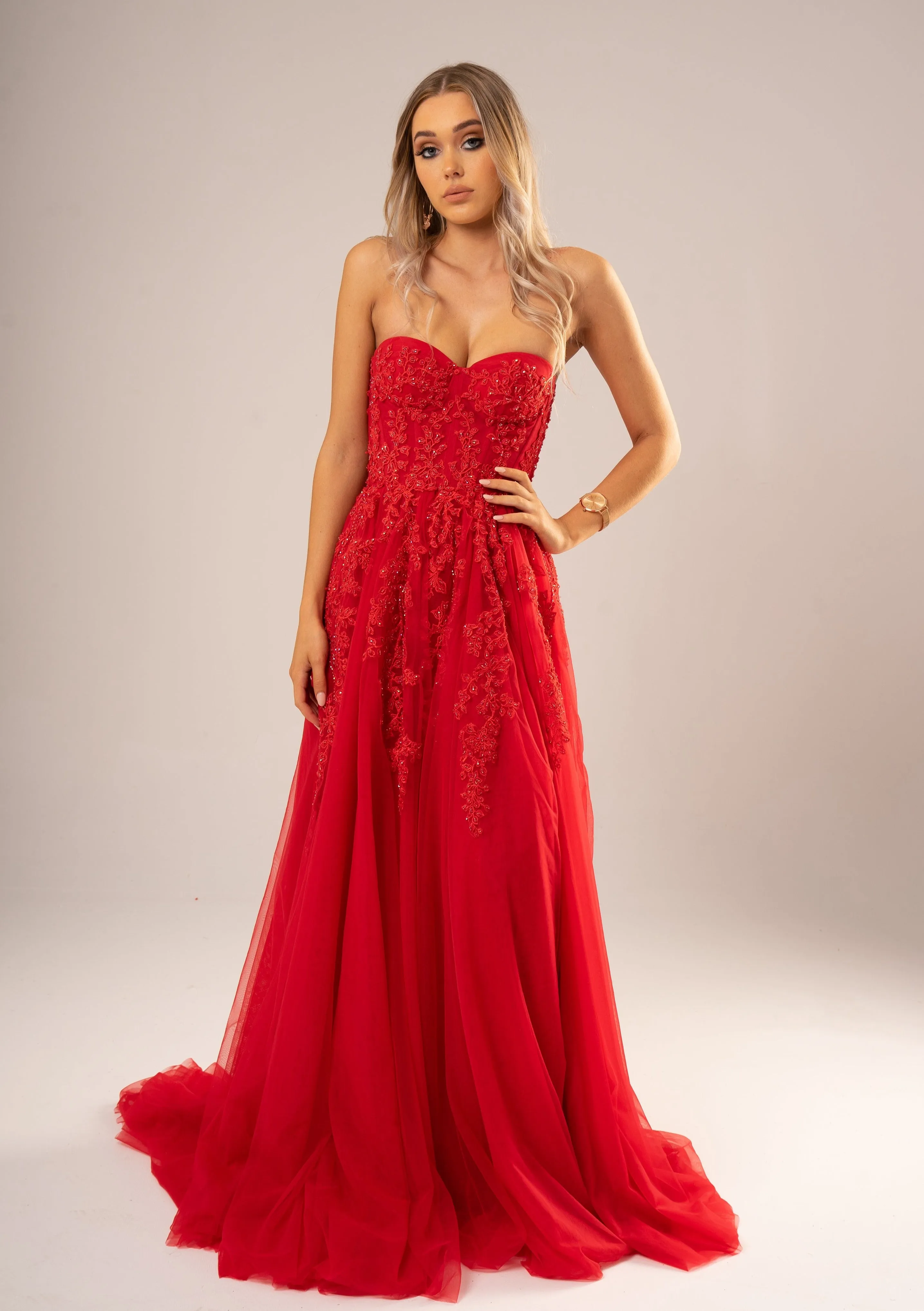 Red bustier top tulle dress with slit for hire