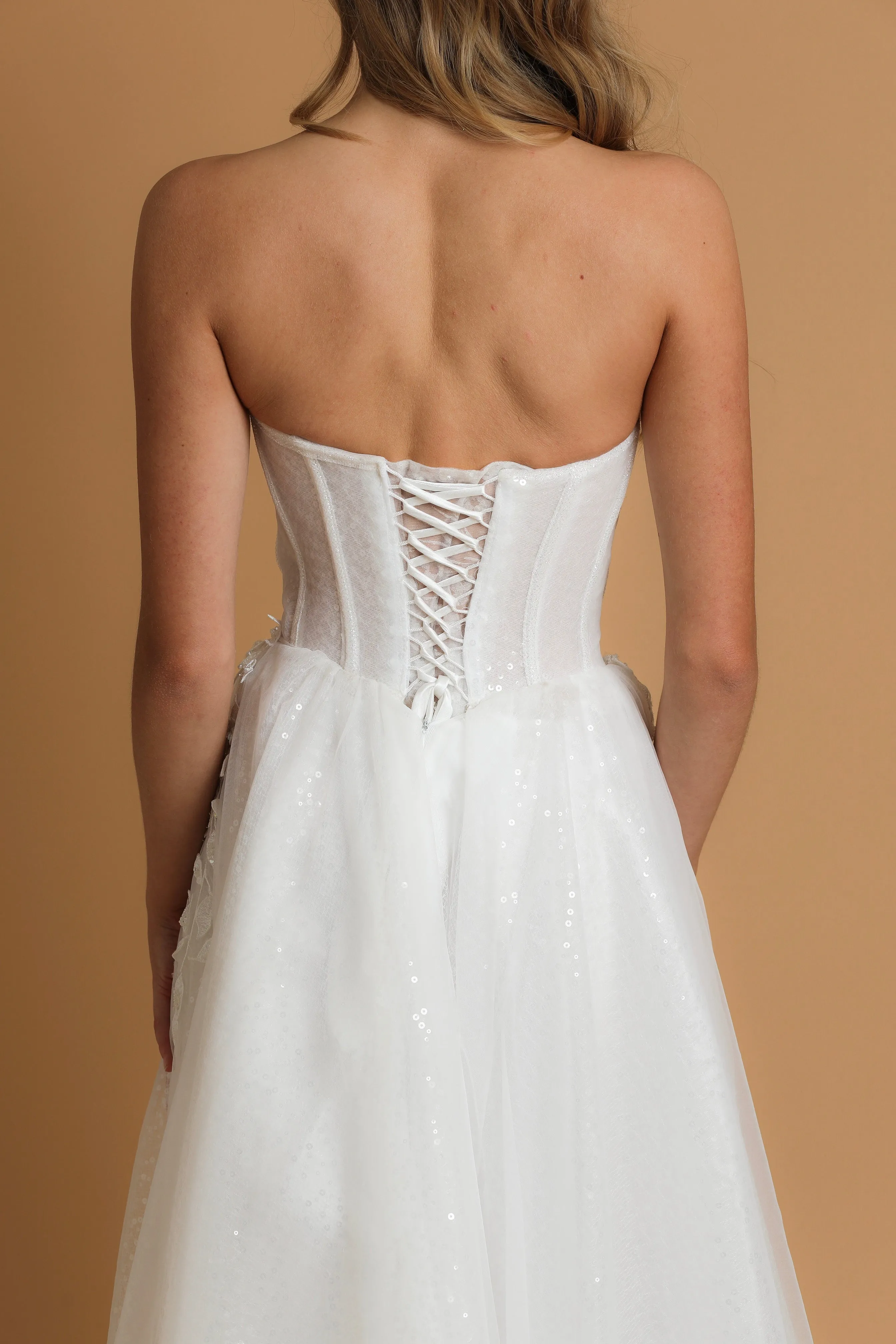 Strapless corset wedding dress with flower details for hire