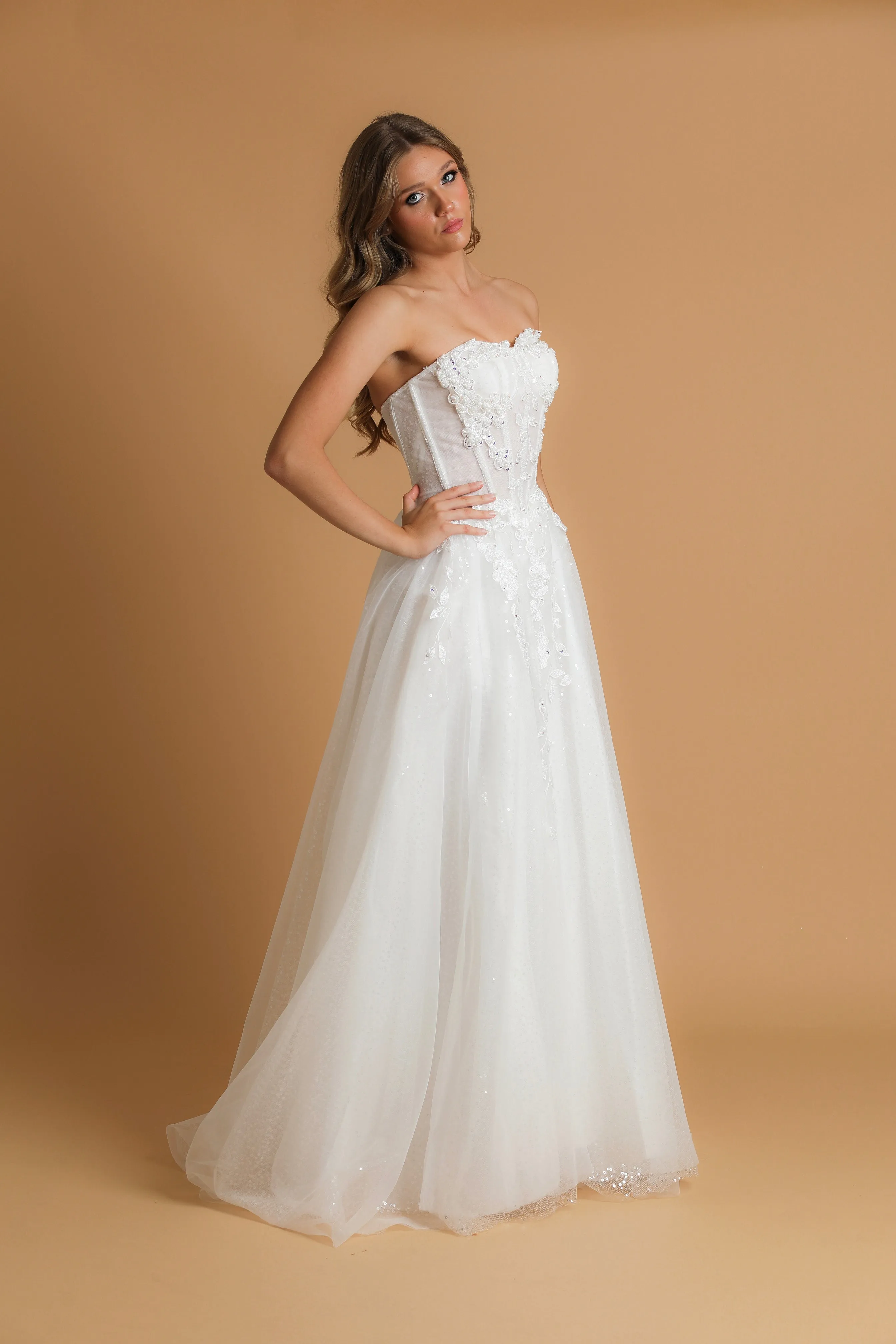 Strapless corset wedding dress with flower details for hire