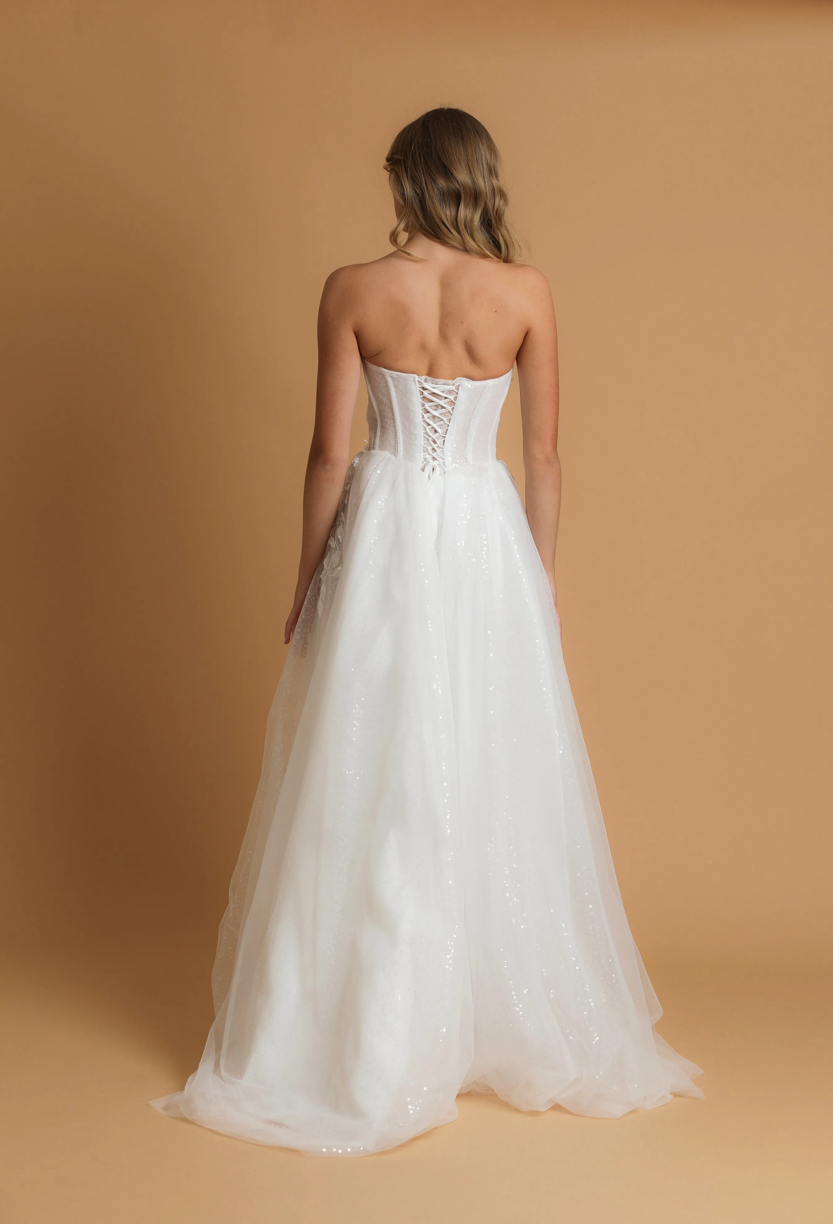 Strapless corset wedding dress with flower details for hire