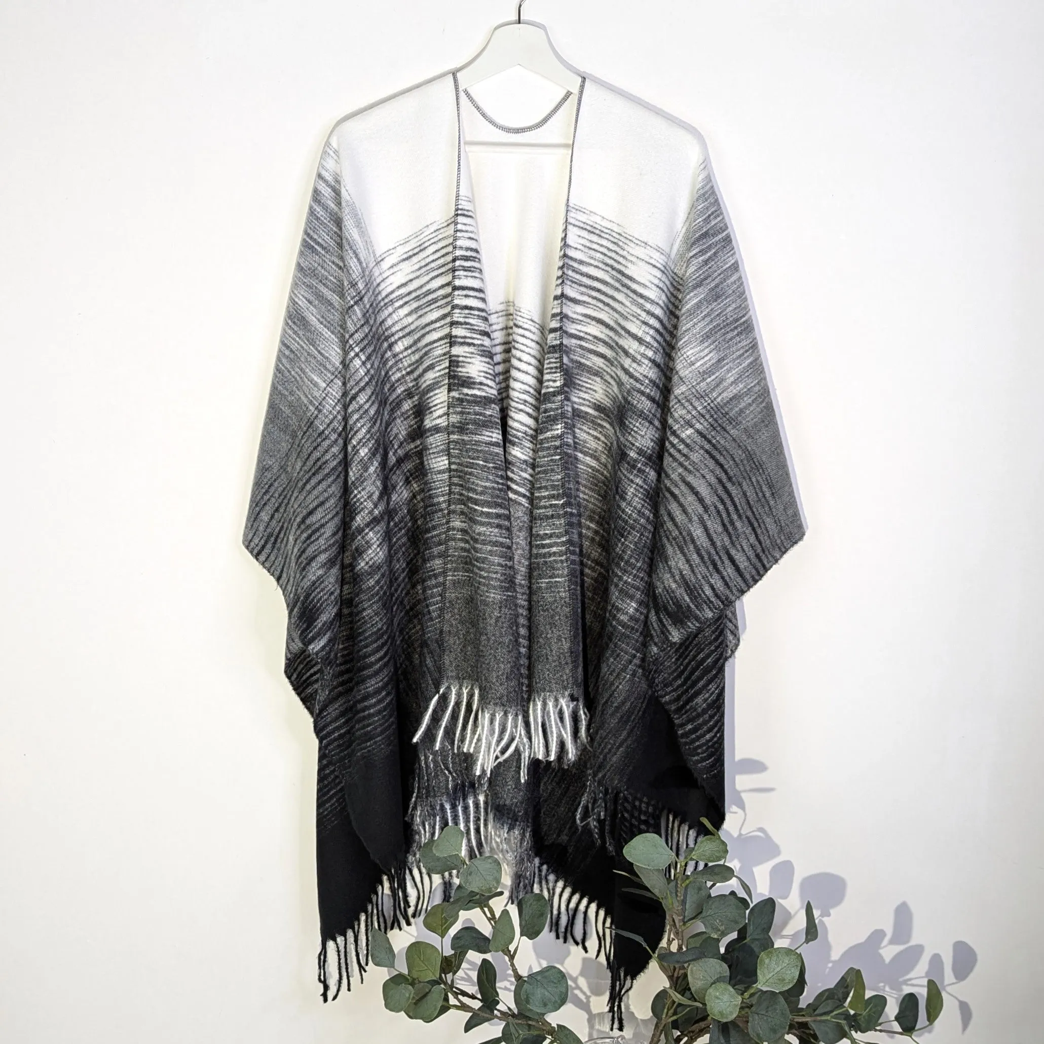 Super soft brushed ombre effect poncho with tassels